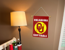 Load image into Gallery viewer, red oklahoma softball garden flag hung on banner pole next to lamp and drinks