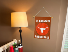 Load image into Gallery viewer, texas basketball garden flag hung on a banner pole next to a lamp and drinks