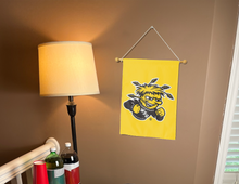 Load image into Gallery viewer, gold wichita state university garden flag hanging on banner pole inside living room