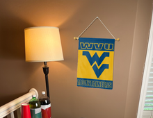 Load image into Gallery viewer, west virginia university garden flag hanging on banner pole inside living room