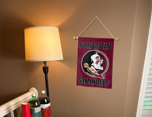 Load image into Gallery viewer, fsu garden flag hung on a banner pole next to a lamp and drinks