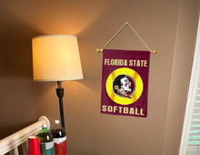 Load image into Gallery viewer, florida state fsu softball garden flag hung on banner pole next to a lamp and drinks