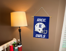 Load image into Gallery viewer, rice football garden flag hung indoors on a banner pole next to a lamp and drinks