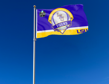 Load image into Gallery viewer, purple and gold LSU Baseball College World Series 2025 Flag attached to flagpole waving in the wind