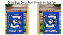Load image into Gallery viewer, blue Creighton University Garden Flag hung from mailbox flagpole displayed from both sides
