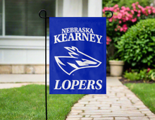 Load image into Gallery viewer, blue unk lopers garden flag hung outside from garden flag stand
