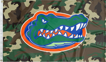 Load image into Gallery viewer, 3x5 foot-wide University of Florida Flag with Camo Background and two metal grommets for indoor home décor