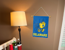 Load image into Gallery viewer, blue University of Delaware YoUDee Garden Flag hung from banner pole inside living room