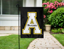 Load image into Gallery viewer, black appalachian state university garden flag hung outside from garden flag stand