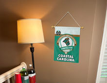 Load image into Gallery viewer, Coastal Carolina College World Series 2025 Baseball Garden Flag hanging on banner pole inside living room