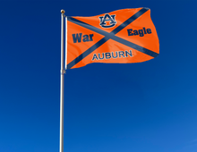 Load image into Gallery viewer, Orange 3x5 Auburn Flag with Auburn War Eagle Logo and Two Metal Grommets attached to a flagpole waving in the wind