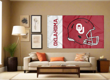 Load image into Gallery viewer, two panel white and red 3x5 University of Oklahoma Football Flag with two metal grommets for indoor home decor covering tan wall of well-lit room