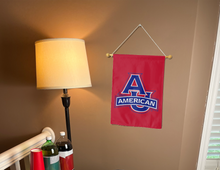 Load image into Gallery viewer, Red 13x18 inch American University Garden flag hung on a banner pole inside a well-lit room