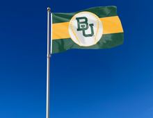 Load image into Gallery viewer, Green and Gold 3 panel 3x5 foot wide Baylor University Baseball Flag with two metal grommets attached to flagpole waving in the wind