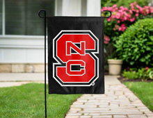 Load image into Gallery viewer, black nc state double sided garden flag hung outside for yard decor
