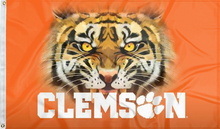 Load image into Gallery viewer, Orange 3x5 feet wide Clemson University Flag with realistic tiger face logo and Two Metal Grommets