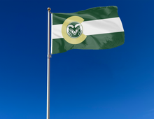 Load image into Gallery viewer, 3x5 foot wide Colorado state University flag with flag of colorado style three green, white, and green stripes with C Rams logo and two metal grommets attached to flagpole waving in the wind