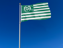 Load image into Gallery viewer, 3x5 foot wide Colorado State University National flag with seven green stripes six white stripes and two metal grommets attached to flagpole waving in the wind
