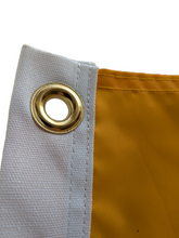 Load image into Gallery viewer, Close-up of a gold grommet on a gold university of iowa applique flag