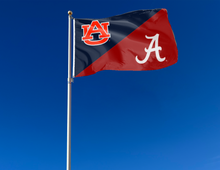 Load image into Gallery viewer, blue and red house divided Auburn Alabama Game flag attached to flagpole waving in the wind