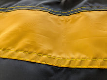 Load image into Gallery viewer, Close-up of hand-sewn gold and black stripes of University of Iowa National Applique flag, showing the detailed stitching and fabric texture.