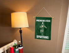 Load image into Gallery viewer, Michigan State Sparty Spartan Mascot garden flag hung inside dorm