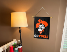 Load image into Gallery viewer, OSU Garden Flag with GO Pokes logo hung inside of college dorm