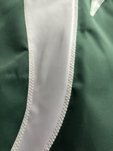 Load image into Gallery viewer, tail end of MSU Spartan helmet logo sewn onto Green Michigan State University Applique Flag with Spartan logo for indoor home décor