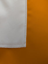 Load image into Gallery viewer, close-up of white Tennessee T logo sewn on orange University of Tennessee applique flag