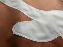 Load image into Gallery viewer, close up of white stitched texas longhorns logo on an orange university of texas longhorns applique flag