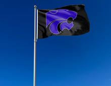 Load image into Gallery viewer, Black 3x5 foot wide Kansas State University Wildcats Flag with two metal grommets attached to flagpole waving in the wind