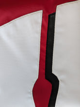 Load image into Gallery viewer, top part of Hand-sewn logo of Red University of Wisconsin Applique Flag with two metal grommets