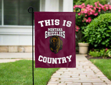 Load image into Gallery viewer, This is Montana Grizzlies Country Garden Flag hung outside in the yard