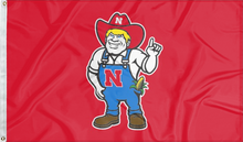 Load image into Gallery viewer, Red University of Nebraska Flag with Herbie Husker Logo