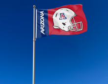 Load image into Gallery viewer, two panel blue and red University of Arizona football flag with two metal grommets attached to flagpole waving in the wind for outdoor home decor
