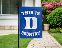 Load image into Gallery viewer, blue double sided garden flag with this is duke country logo for yard decor