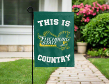 Load image into Gallery viewer, green double sided garden flag with this is fitchburg state falcons country logo for yard decor
