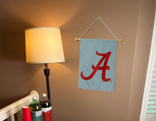 Load image into Gallery viewer, Back side of alabama Crimson Tide Seal garden flag hung inside a college dorm for dorm decor