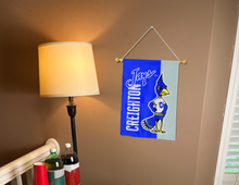 Load image into Gallery viewer, blue and grey creighton university vintage garden flag inside college dorm