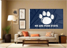 Load image into Gallery viewer, indoor display of blue penn state university flag with we are penn state logo for man cave decor