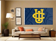 Load image into Gallery viewer, indoor display of blue uc irvine flag for man cave decor