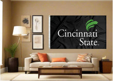Load image into Gallery viewer, indoor display of black cincinnati technical and community college flag for man cave decor