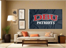 Load image into Gallery viewer, indoor display of dallas baptist university flag with dbu patriots logo for man cave decor