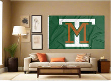 Load image into Gallery viewer, indoor display of green montana tech flag with mt interlock logo for fan cave decor