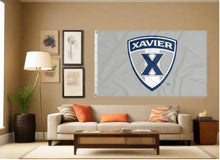 Load image into Gallery viewer, indoor display of grey xavier university flag with shield logo for man cave decor