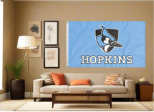 Load image into Gallery viewer, indoor display of blue johns hopkins blue jays flag for man cave decor