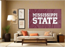 Load image into Gallery viewer, indoor display of mississippi state university flag with mississippi state logo for man cave decor