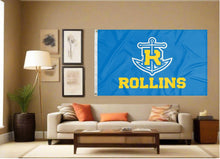 Load image into Gallery viewer, indoor display of blue rollins college tars flag for man cave decor