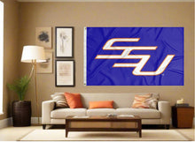 Load image into Gallery viewer, indoor display of blue savannah state university flag with ssu logo for man cave decor
