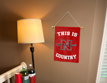 Load image into Gallery viewer, this is nicholls state country garden flag for college dorm decor hung indoors